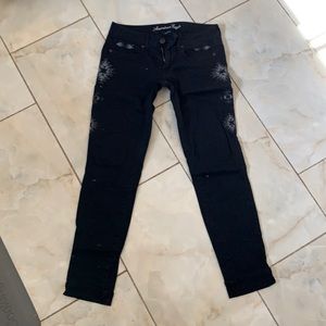 AE tribal skinny jeans